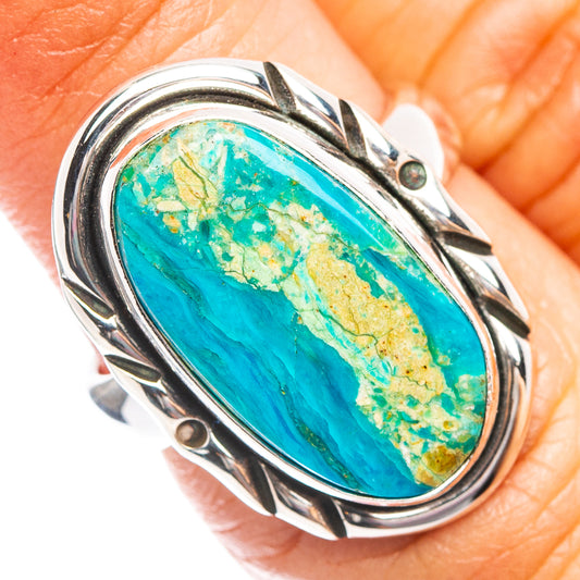 Sterling silver opal ring with oval turquoise stone and decorative bezel prongs