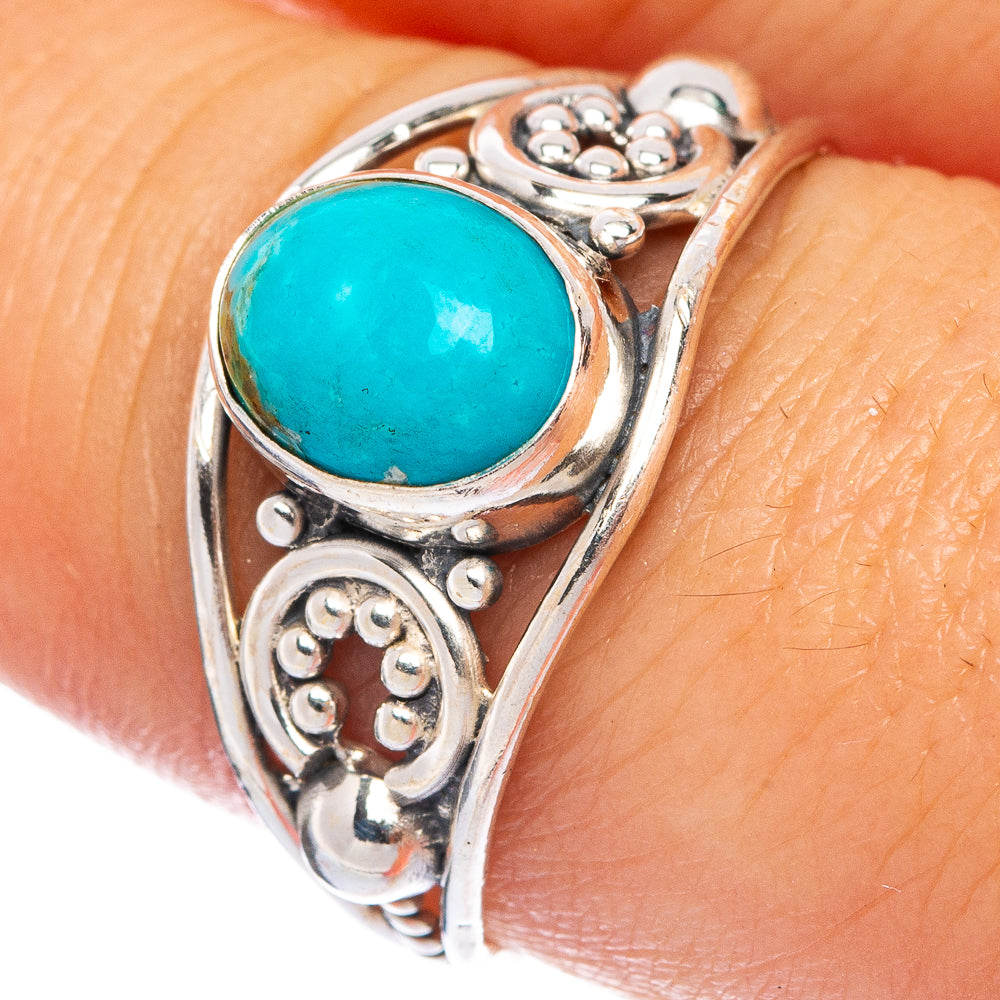 Silver ring with turquoise oval cabochon and ornate filigree band, size 8