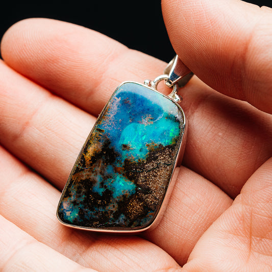 Sterling silver opal pendant with teardrop boulder opal cabochon, blue and teal tones