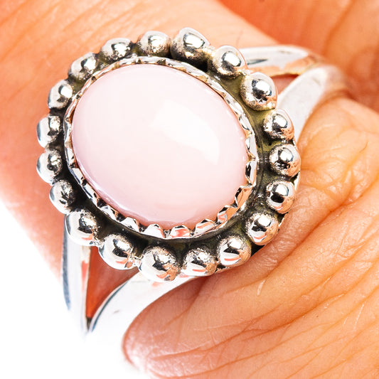 Sterling silver native-style ring with pink oval stone and bead border