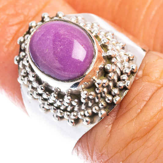 Sterling silver oval ring with purple phosphosiderite stone and beaded halo setting