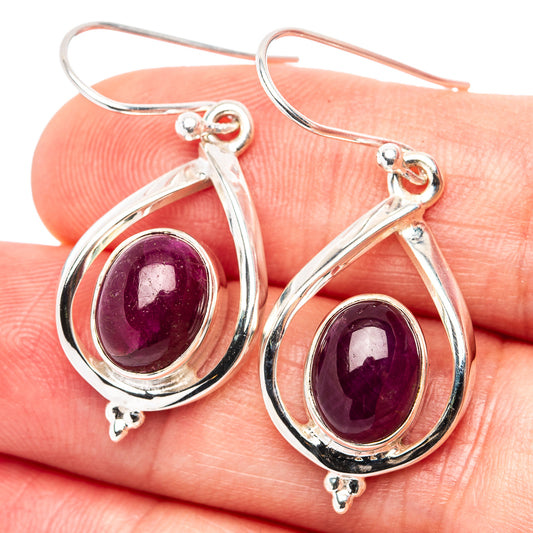 Teardrop ruby drop earrings in polished .925 sterling silver, purple cabochon