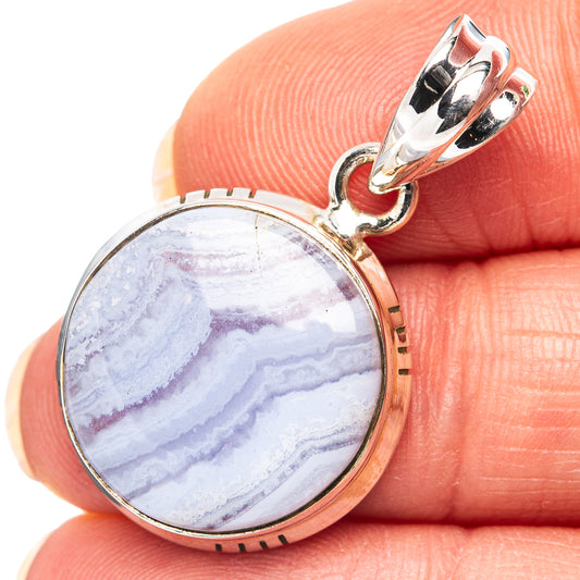 Sterling silver round blue lace agate pendant with bail, close-up on bezel