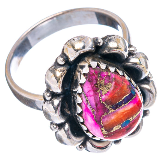 Sterling silver oval gemstone ring with swirl bezel, side view showing vibrant pink orange inlay