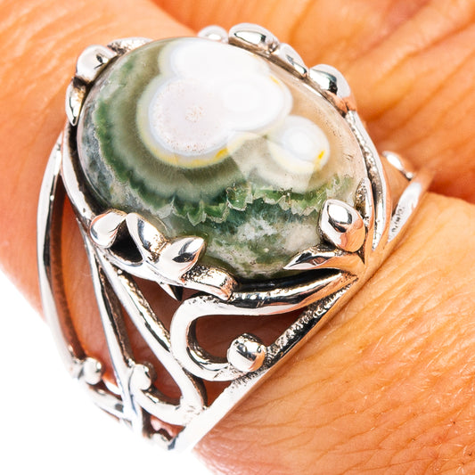 Sterling silver ring with oval ocean jasper cabochon and ornate leaf setting