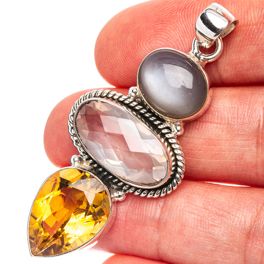 Sterling silver pendant with grey moonstone and citrine with clear faceted stone