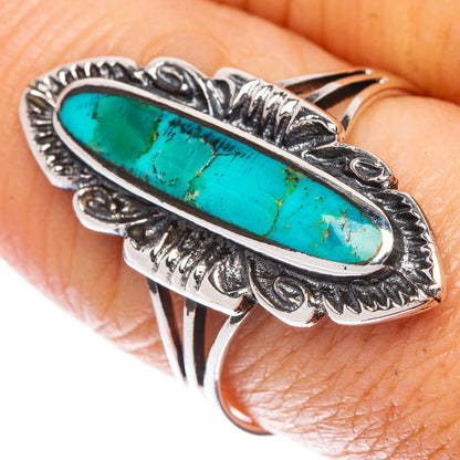 Oval turquoise cabochon sterling silver ring, ornate bezel and rope details