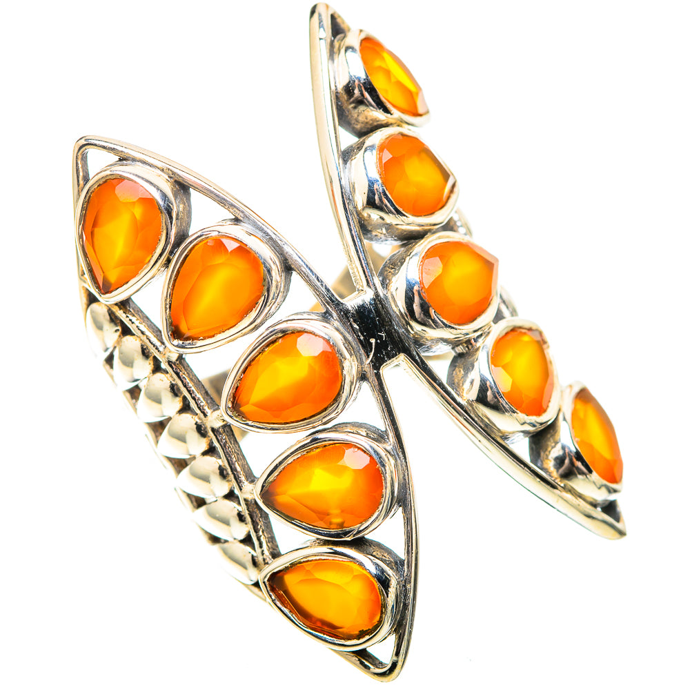 Sterling silver ring featuring orange oval carnelian stones with side marquise curve