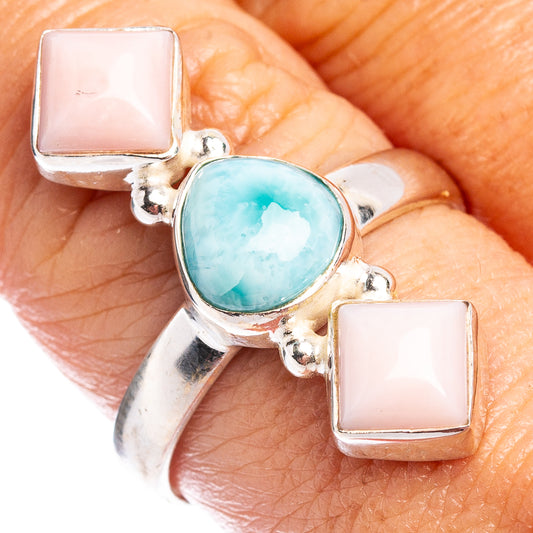 Sterling silver ring with blue oval stone and pink square opal accents
