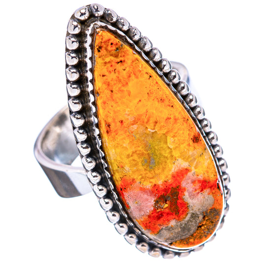 Amber-orange teardrop jasper ring, .925 sterling silver band with bead-edge detail