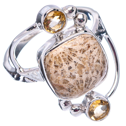 Sterling silver oval fossil coral ring with bezel-set citrine stones at three points