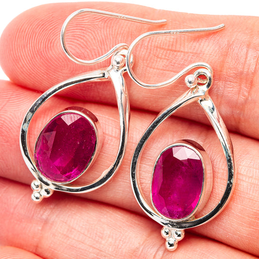 Sterling silver teardrop drop earrings with round magenta ruby stones and hook backs