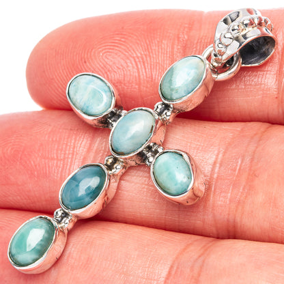 Sterling silver larimar cross pendant with five oval blue-green stones