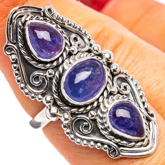 Sterling silver ring with three oval tanzanite-look blue gemstones in ornate setting
