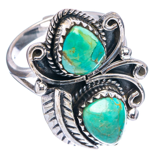 Sterling-silver turquoise ring with two oval green stones and leaf-like engraving