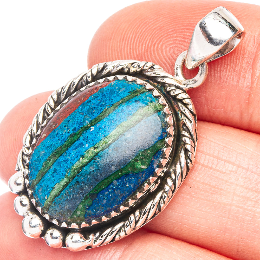 Oval sterling silver calsilica pendant with blue-green stone bezel and bail