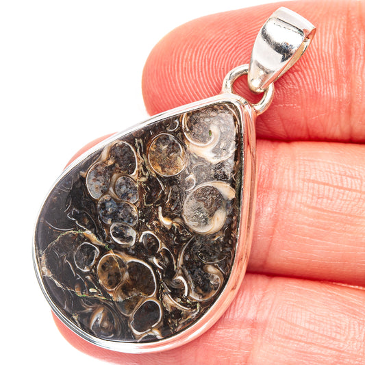 Sterling silver turritella agate teardrop pendant with detailed fossil pattern