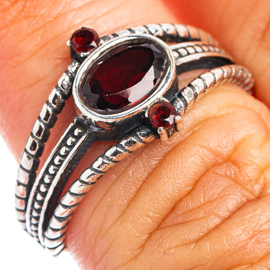 Garnet dainty ring with red oval stone and ornate .925 sterling silver band