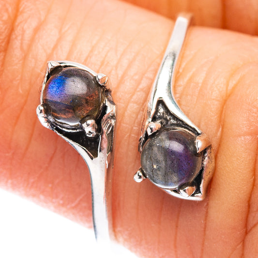 Sterling silver ring with bezel-set oval labradorite and side prongs