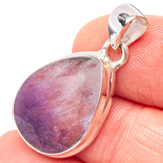 Sterling silver amethyst teardrop pendant with bi-color purple gemstone cabochon