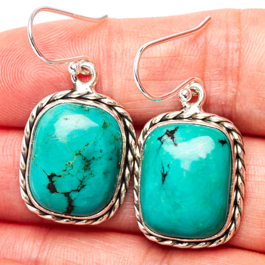 Turquoise cabochon drop earrings in .925 sterling silver with ornate wire border