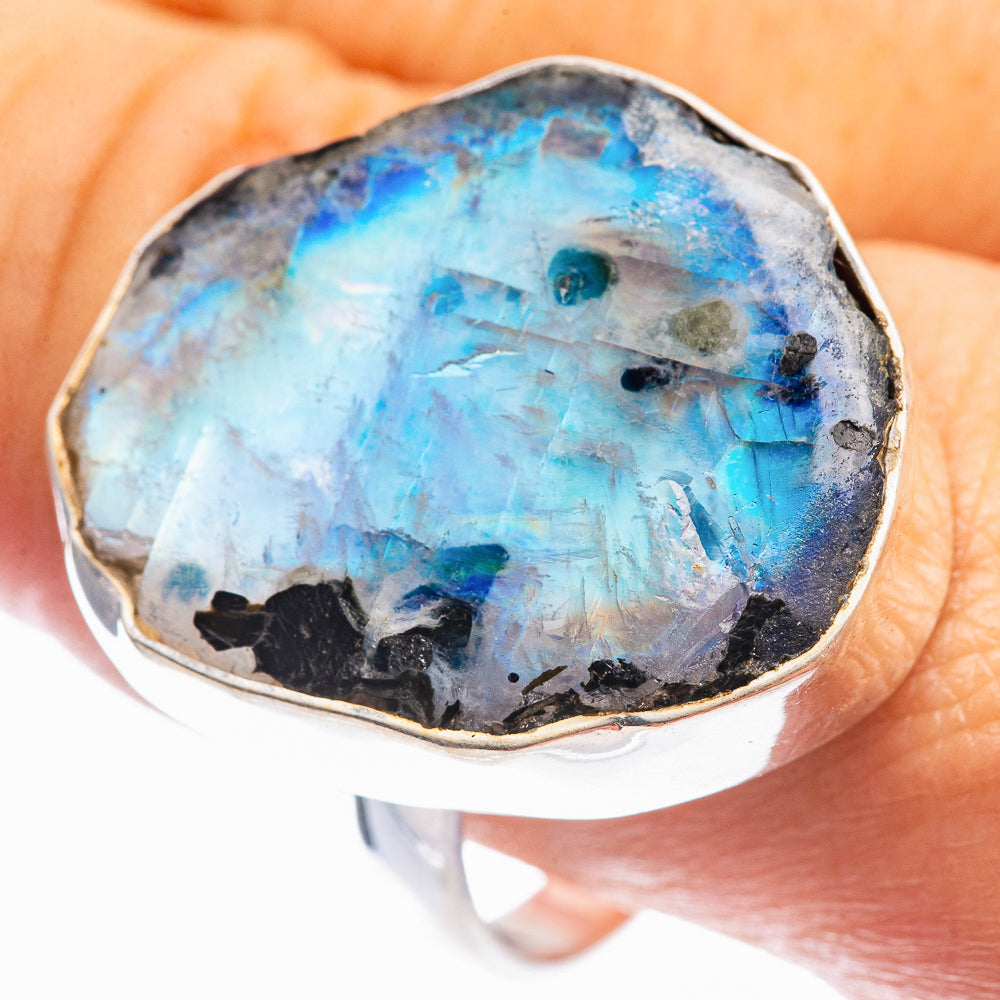 Sterling silver moonstone ring with bright blue stone and black inclusions
