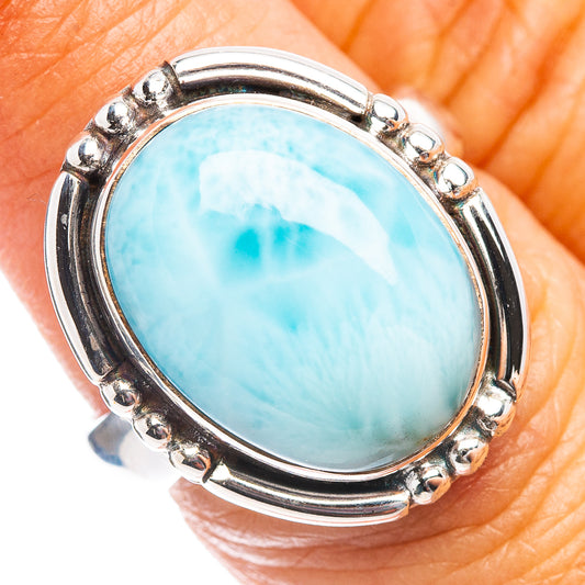 Larimar gemstone ring with oval turquoise stone, ornate silver prong setting
