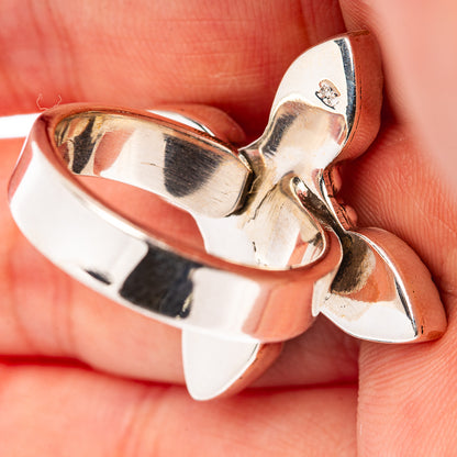 Sterling silver ring band and setting, showing polished heart-shaped underside