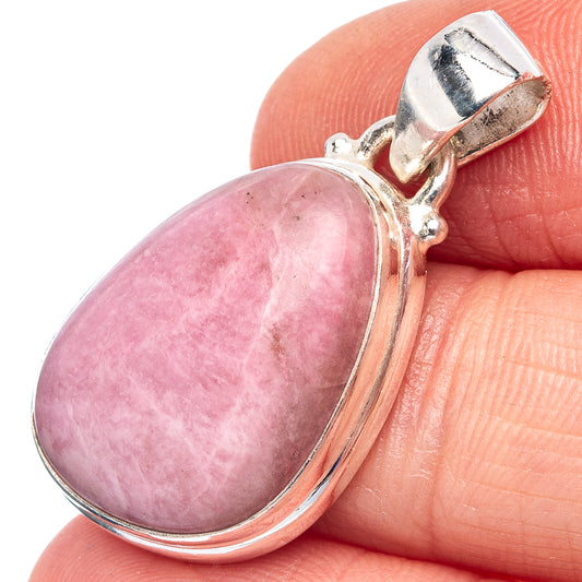 Oval pink petalite pendant with .925 sterling silver bezel and bail loop.
