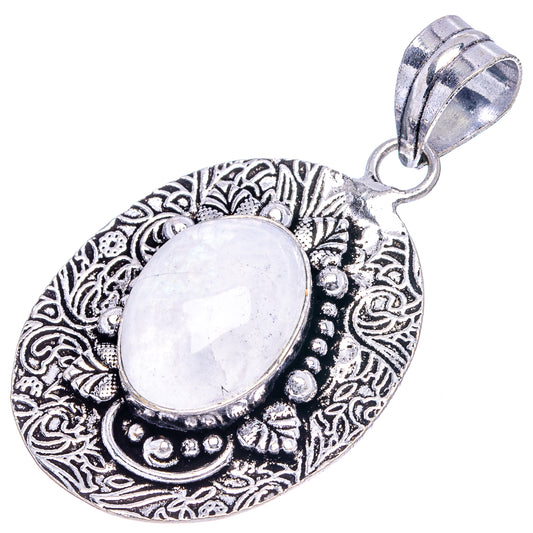 German silver moonstone pendant with oval cabochon and ornate filigree bezel