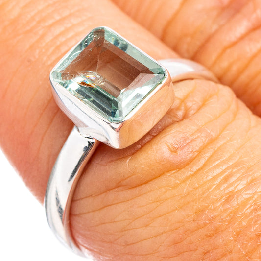 Aquamarine square gemstone sterling silver ring on finger, size 8