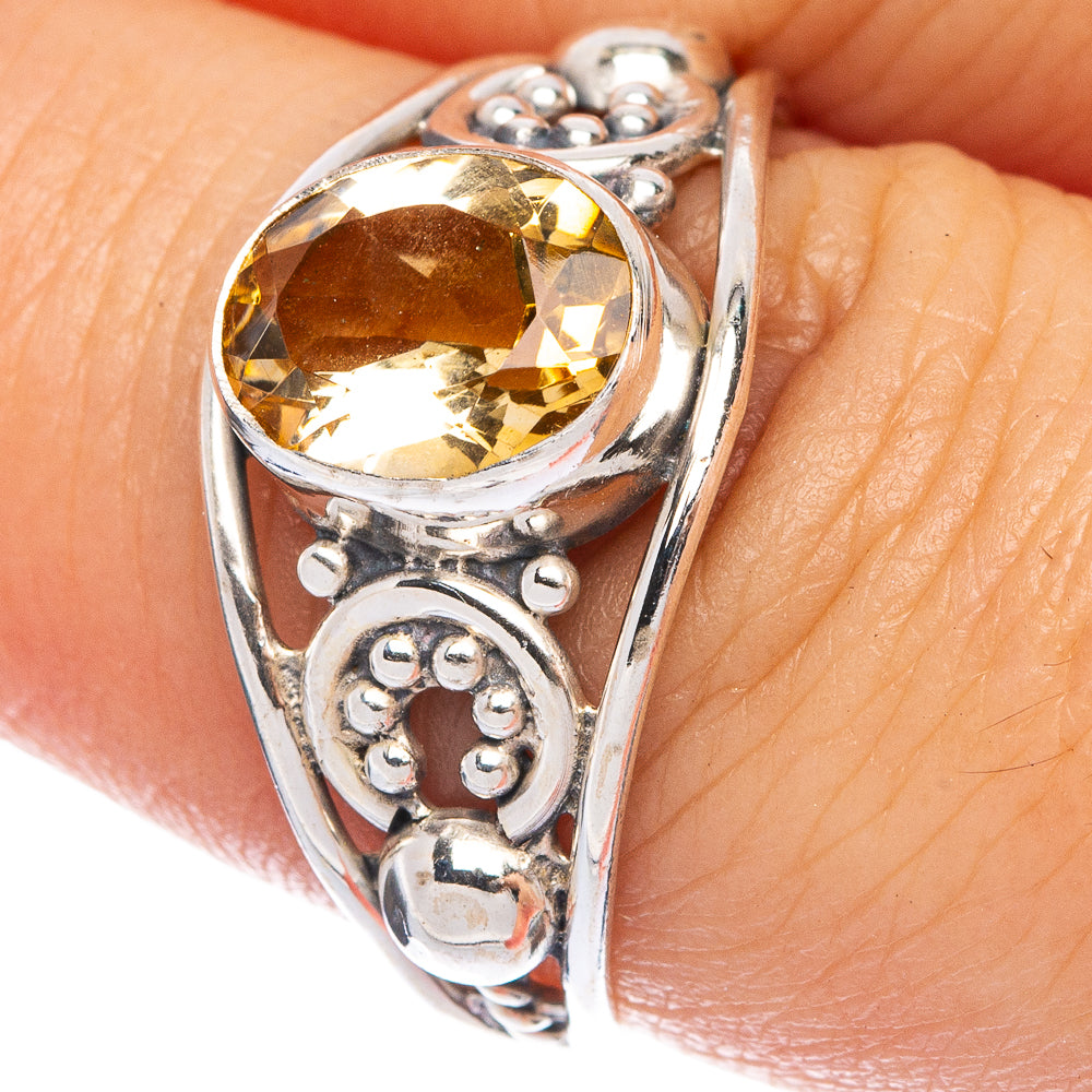 Sterling silver dainty ring with faceted oval citrine gemstone and ornate filigree setting