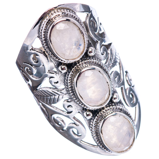 Polished .925 sterling silver ring with three oval moonstones and carved scrolling band