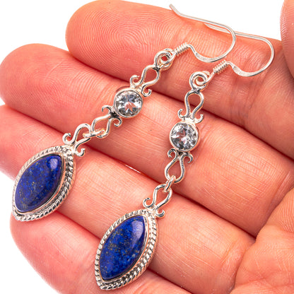 Silver drop earrings with blue teardrop and oval lapis-style stones