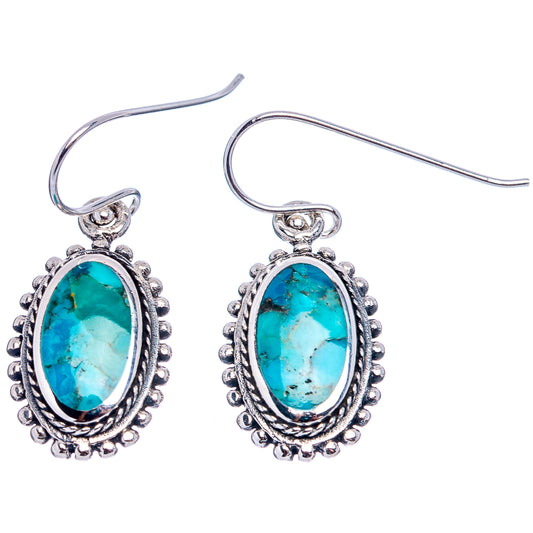 Oval turquoise stone drop earrings in .925 sterling silver with ornate border and hook backs