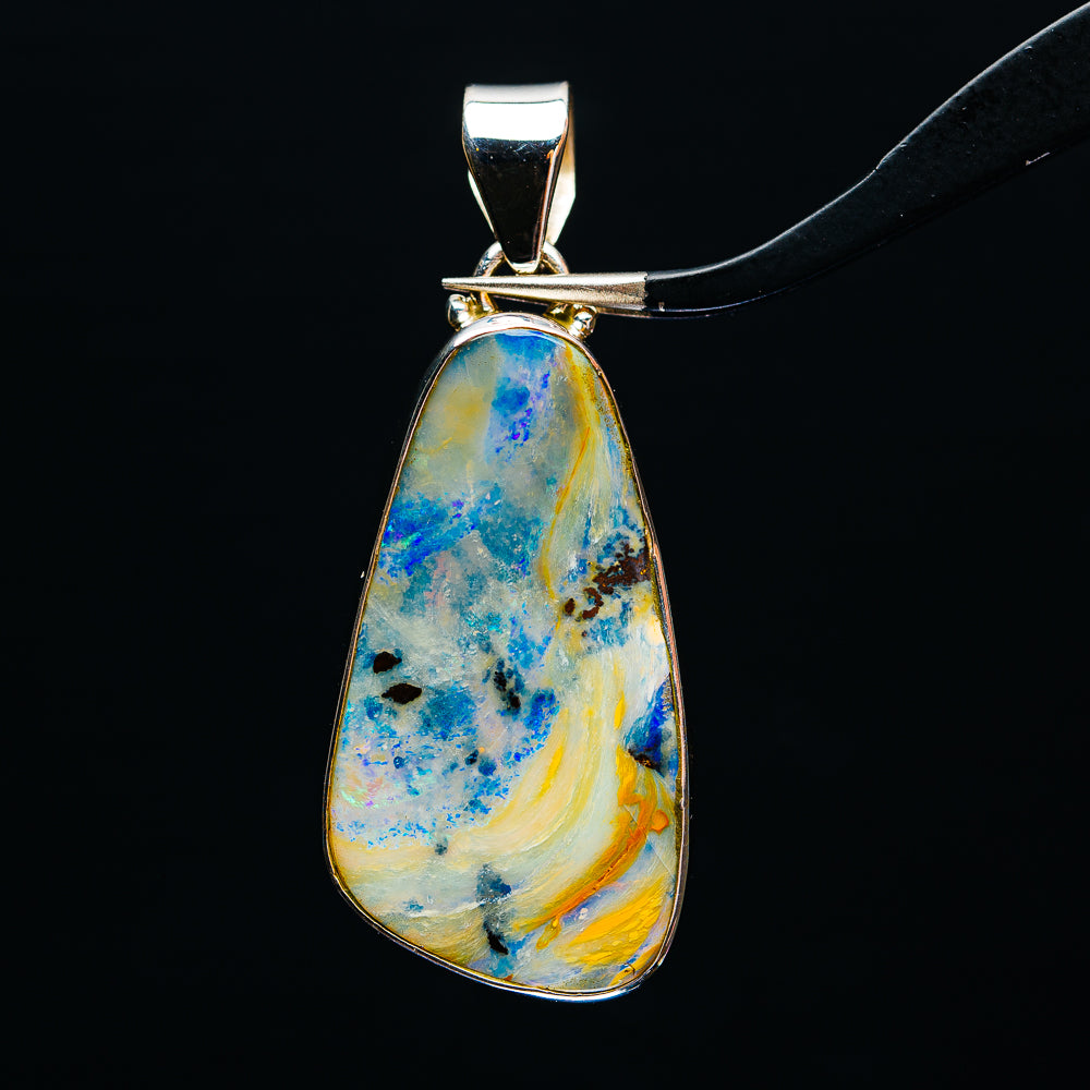 Sterling silver teardrop boulder opal pendant, blue and yellow stone with bail