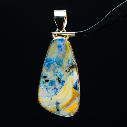 Sterling silver teardrop boulder opal pendant, blue and yellow stone with bail