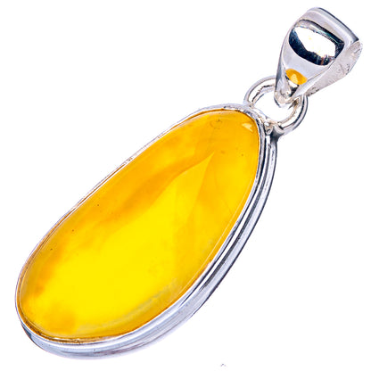 Oval yellow amber pendant in 925 sterling silver with top bail loop
