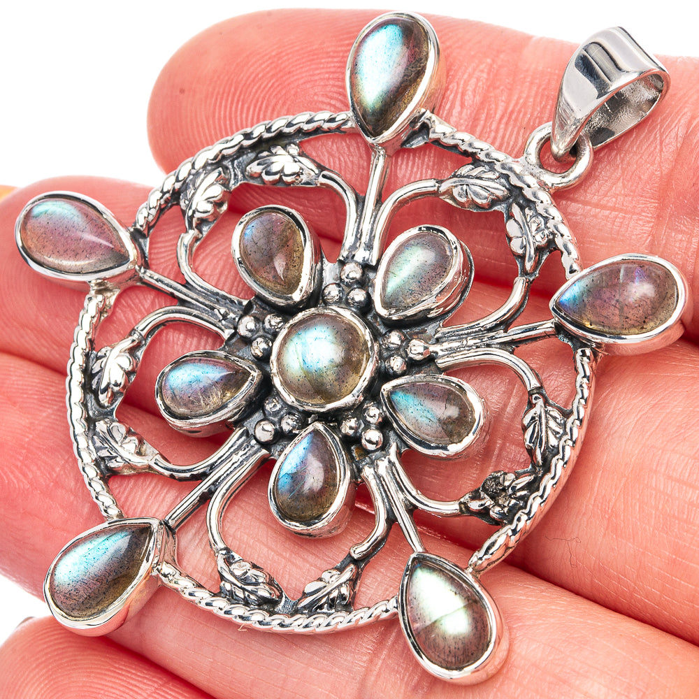 925 sterling silver snowflake pendant with iridescent oval labradorite stones