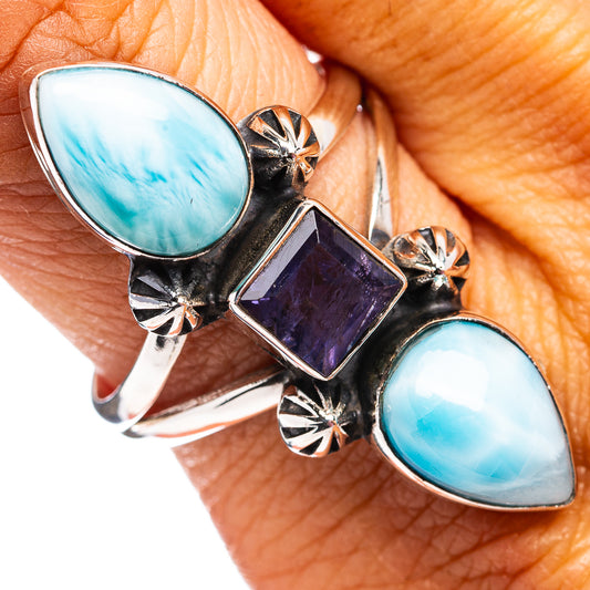 Sterling silver ring with oval blue larimar stones and a purple iolite center