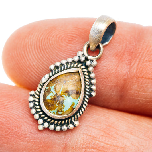 Sterling silver teardrop pendant with turquoise-style stone and beaded border