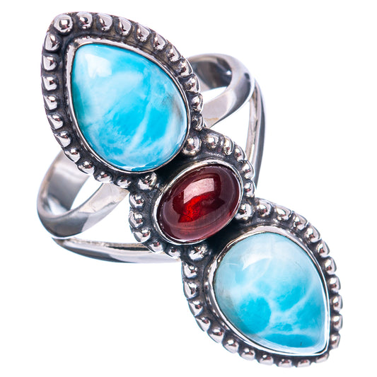 Size 8 .925 sterling silver ring with haloed teardrop larimar and a red garnet oval