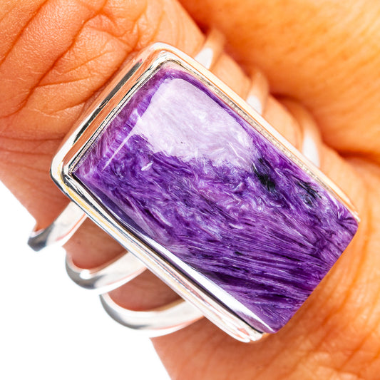 Sterling silver ring with rectangular purple charoite stone bezel on open bands