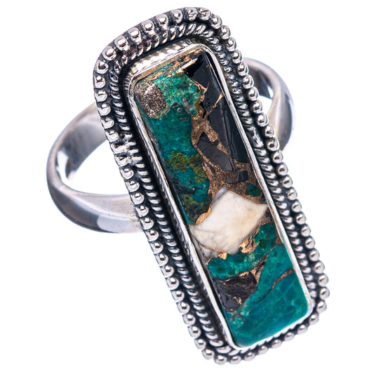 Sterling silver ring with bezel-set rectangular turquoise-green and beige inlay and textured border