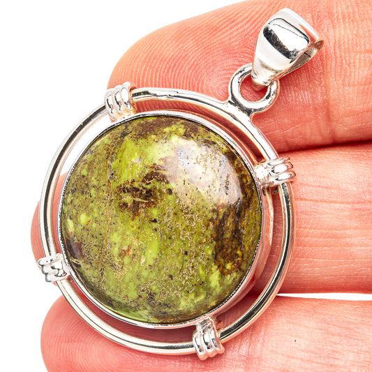 Round gaspeite cabochon pendant, green-gold stone in .925 sterling silver bezel
