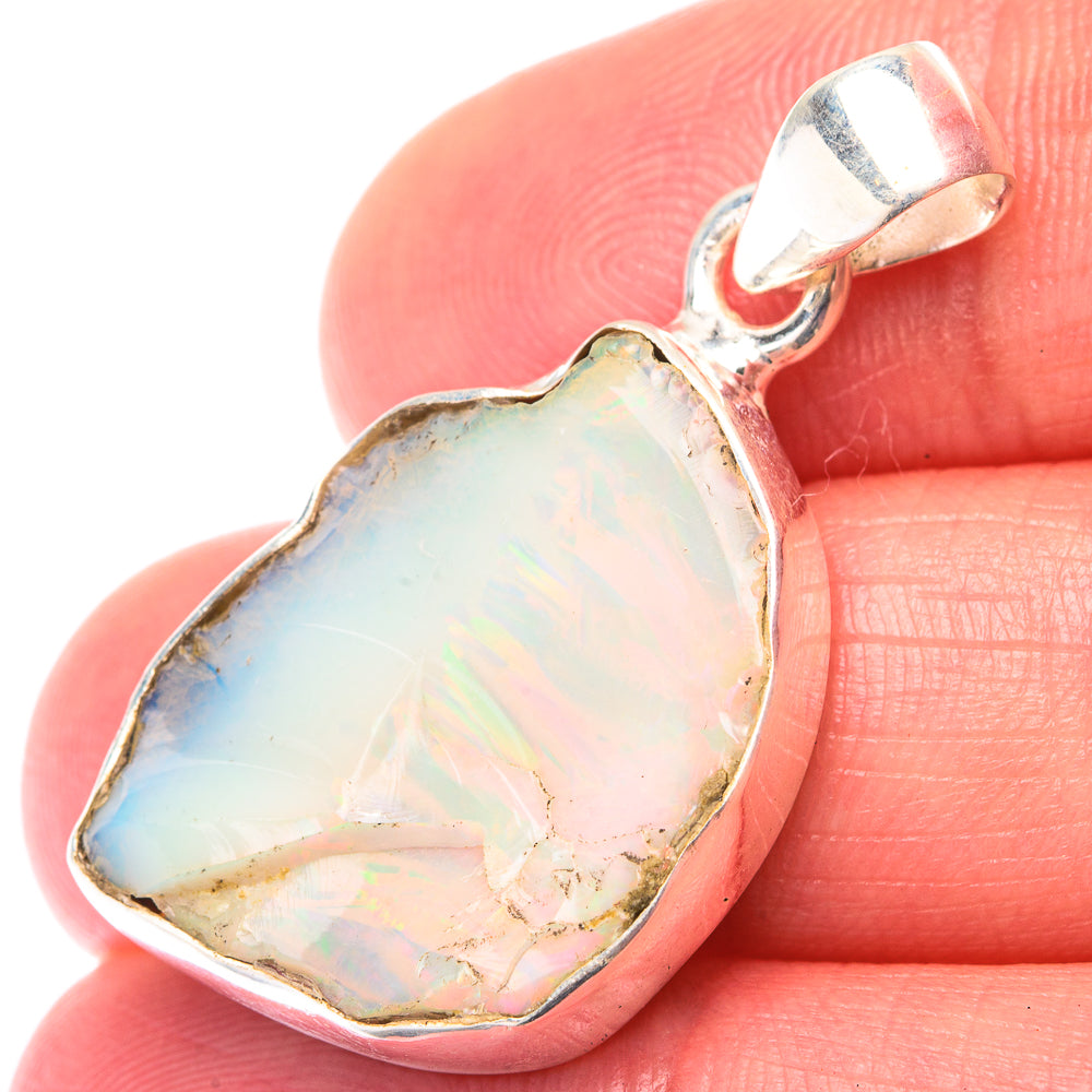 Raw Ethiopian opal pendant in 925 sterling silver, heart-shaped iridescent stone with bail