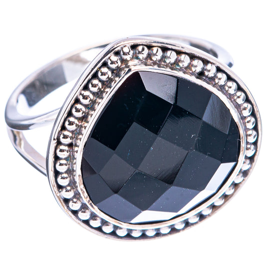 Sterling silver ring with large black faceted oval gemstone and beaded border