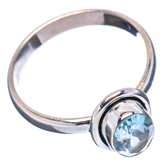 Sterling silver oval blue topaz ring, side view with twisted bezel, size 8