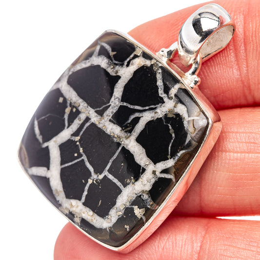 925 sterling silver septarian pendant with black stone and white veining, top bail