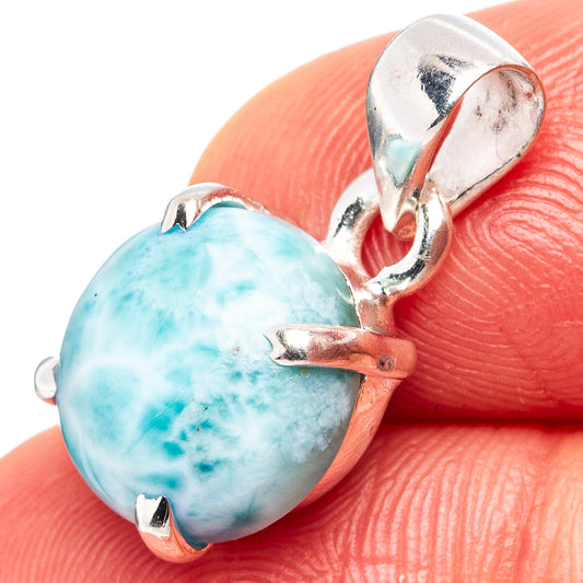 Close-up of .925 sterling silver bail holding oval blue larimar cabochon in bezel